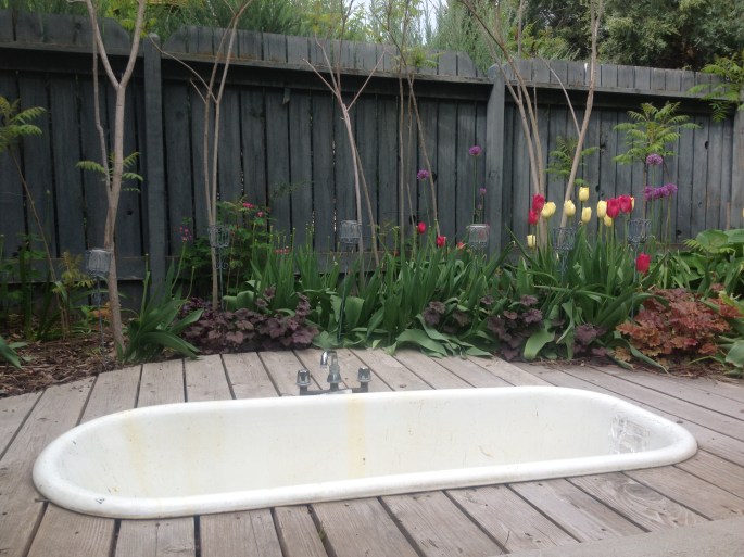 I love this. John and Keely's hot tub in the back yard. How cool is that?