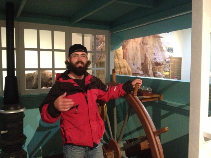 Dominique as Steamship Captain. Keep your eyes on the river, Captain, those snags will sink your ship!