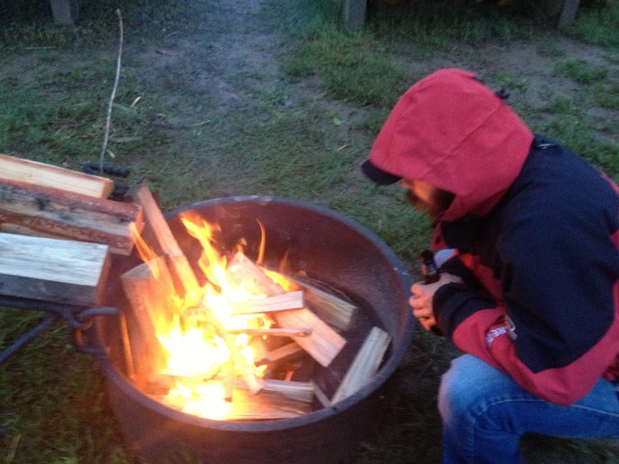 Despite the rainy and wet conditions, we made a fire for warmth and comfort. Thanks to the campers next door who helped me haul their leftover wood over, chopped kindling, and wrapped paper up in plastic for me. And, gave me a lighter!  So nice!