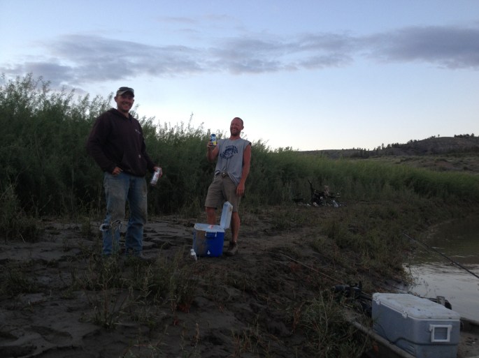 Eli, left, and Brandon on the riverbank. They had been paddlefish fishing there all day long. They stomped out a sizable trail down the riverbank. I've never been so happy to see anyone in my life!
