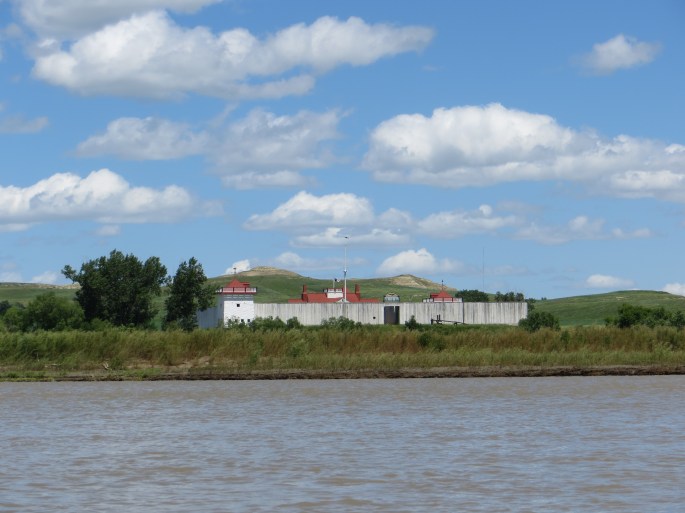 Fort Union looking easily accessible. It is an illusion. You cannot see the muddy water-swamped mosquito-infested slog that you will encounter if you start walking toward the fort. Poor Shawn. He was not a happy camper.