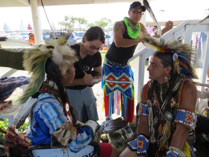 Jessica Giard, Chamberlain river angel, asking a few questions for a write-up in the Chamberlain newspaper.